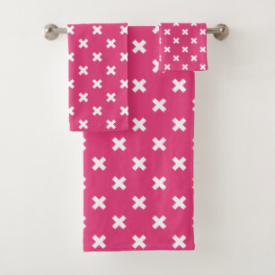 White cross stitches on fuchsia