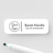 White employee name tag (In situ)