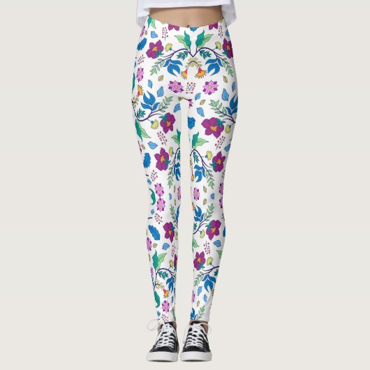 White leggings with vibrant floral patterns (Devant)