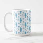 White mug with a blue cactus pattern (Gauche)