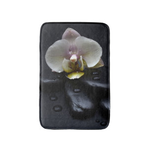 White Orchid on Black Stones Badmat