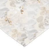 White orchids on a light cream tafelkleed (Gekanteld)