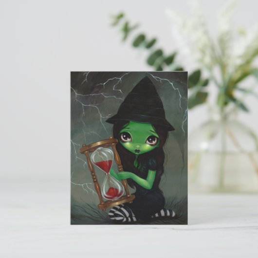 Wicked Witch et sa carte postale en sablier (Debout devant)