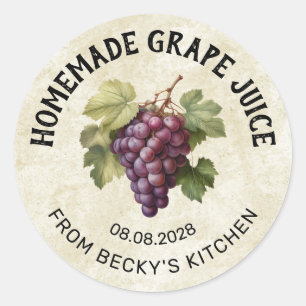 Wijnstokoude druivensapbliklabel met rode druiven ronde sticker