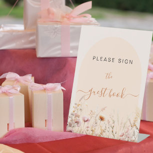 Wilde bloemen boog perzik teken het gastenboek reclamebord met voetstuk