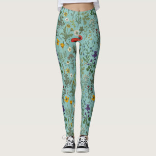 Wilde bloemen collage op blauw leggings