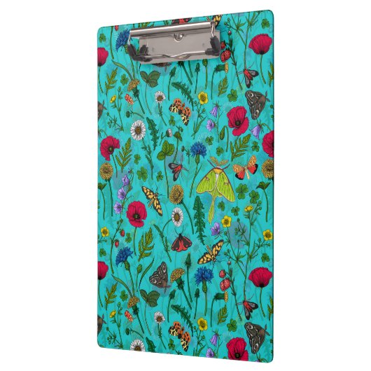 Wilde bloemen en motten op blauwgroen klembord (Links)