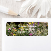 Wilde bloemen in veldfotoolieschilderadres etiket (Insitu)