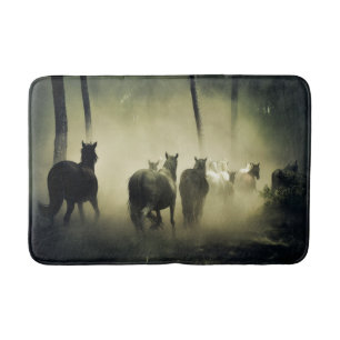 Wilde paarden die lopen badmat