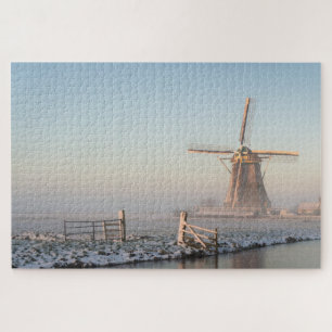 Windmolen en hek tijdens de winterzonsopgang legpuzzel