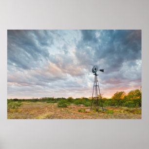 Windmolen en wolken op zonsondergang poster