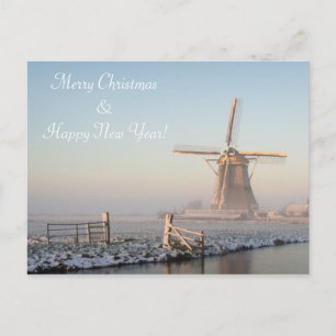 Windmolen in de winter bij kerstkaart zonsopgang feestdagenkaart
