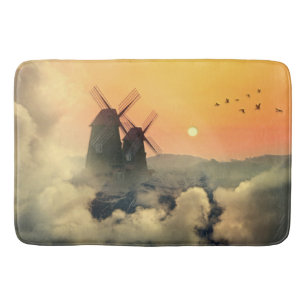 Windmolens, bergen en wolken badmat