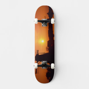 Windmolens bij zonsondergang, Kinderdijk, Nederlan Skateboard