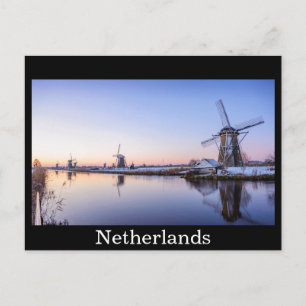 Windmolens in briefkaart met zwarte wintertekst