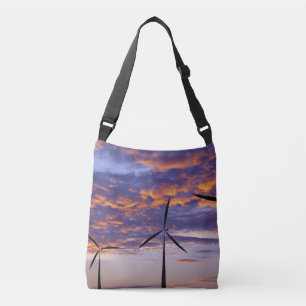 Windmolenturbine op zonsondergang crossbody tas
