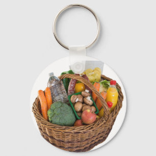Winkelmand met voedingsmiddelen, groenten en fruit sleutelhanger