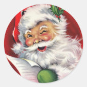 winnende kerstman die zijn lijst controleert ronde sticker (Voorkant)