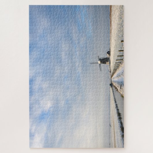 Winterlandschap met sneeuw en windmolen in Nederla Legpuzzel (Verticaal)