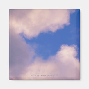 Wispy wolken tegen blauwe hemel magneet