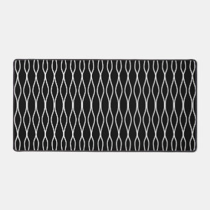 Wit abstract golvend geometrisch patroon op zwart bureaumat