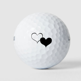 Wit en zwart hart houden van kunst golfballen