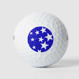 Wit sterpatroon op blauwe achtergrond golfballen