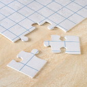 Wit verfrommeld papier blauwe lijnen legpuzzel (Zijkant)