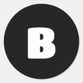 Wit vet initiaal op zwart ronde sticker