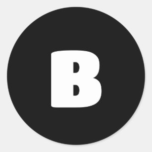 Wit vet initiaal op zwart ronde sticker