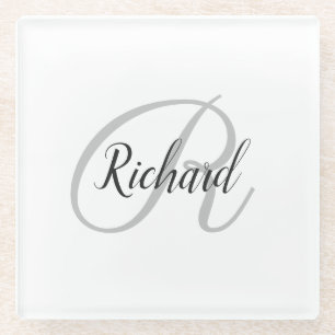 Witte achtergrond met monogram glazen onderzetter