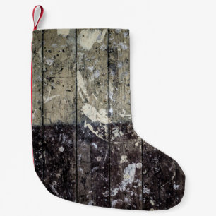 Witte afdruk op bruin hout kleine kerstsok