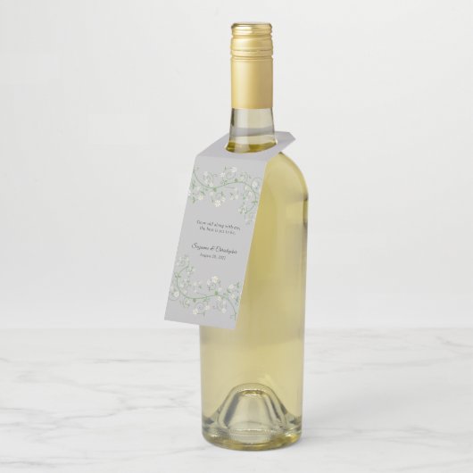 Witte bloeiende wijn op grijs Label met flesje (Schuin)