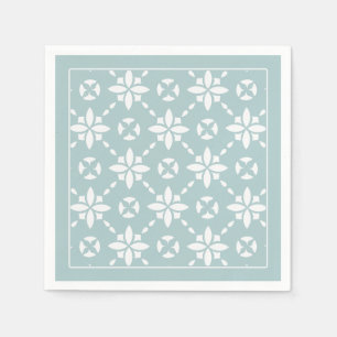 Witte bloem betegeld patroon op sage rand servet