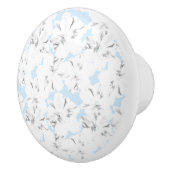 Witte bloemen op lichtblauw. keramische knop (Rechts)