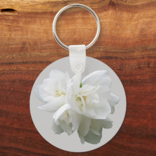 Witte bloemen op lichte grijze achtergrond sleutelhanger