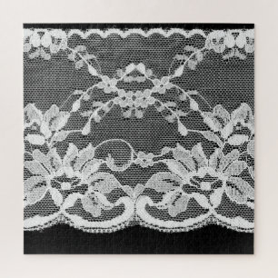 Witte bloemenkant: zwarte achtergrond. legpuzzel