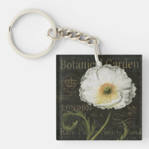 Witte bloesems en bladeren sleutelhanger