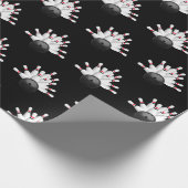 Witte bowling pinnen op zwart cadeaupapier (Hoek)