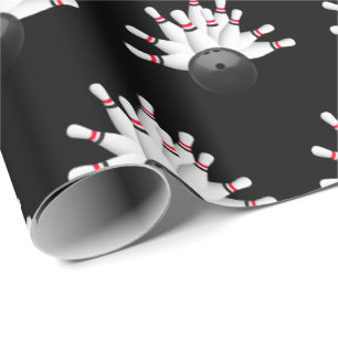 witte bowlingpennen op zwart cadeaupapier