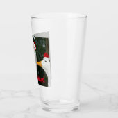 Witte eenden dragen rode kerstmutsen vakantie glas (Links)