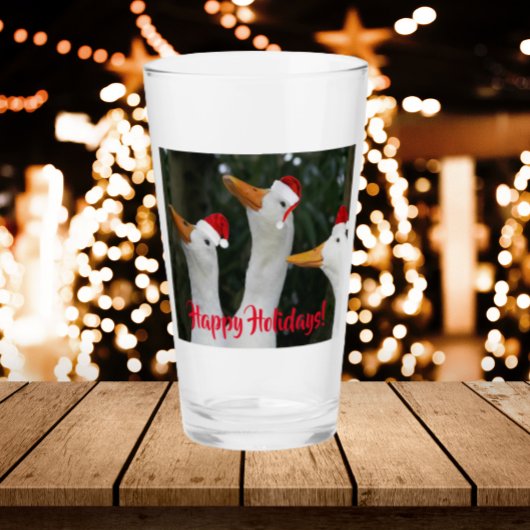 Witte eenden dragen rode kerstmutsen vakantie glas