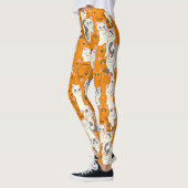 Witte en gember katten patroon groene ogen blauwe leggings (Links)