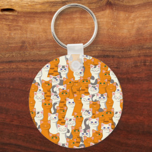 Witte en gember katten patroon groene ogen blauwe sleutelhanger