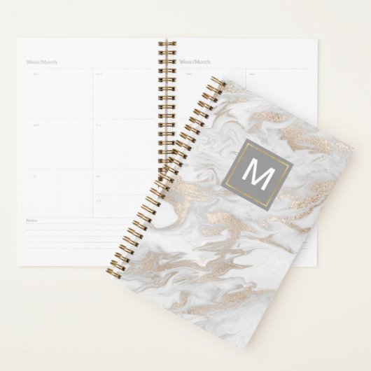 Witte en goudkleurige planner (Display)