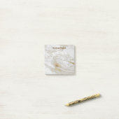 Witte en grijze goudkorrel post-it® notes (Op bureau)