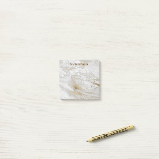 Witte en grijze goudkorrel post-it® notes (Op bureau)