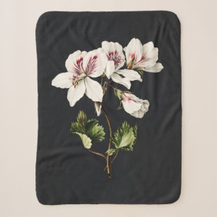 witte en roze bloemen op zwart sherpa deken