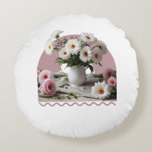 Witte en roze bloemen rond kussen