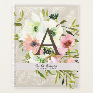 Witte en roze rozen op duif grijze boekenkapje planner